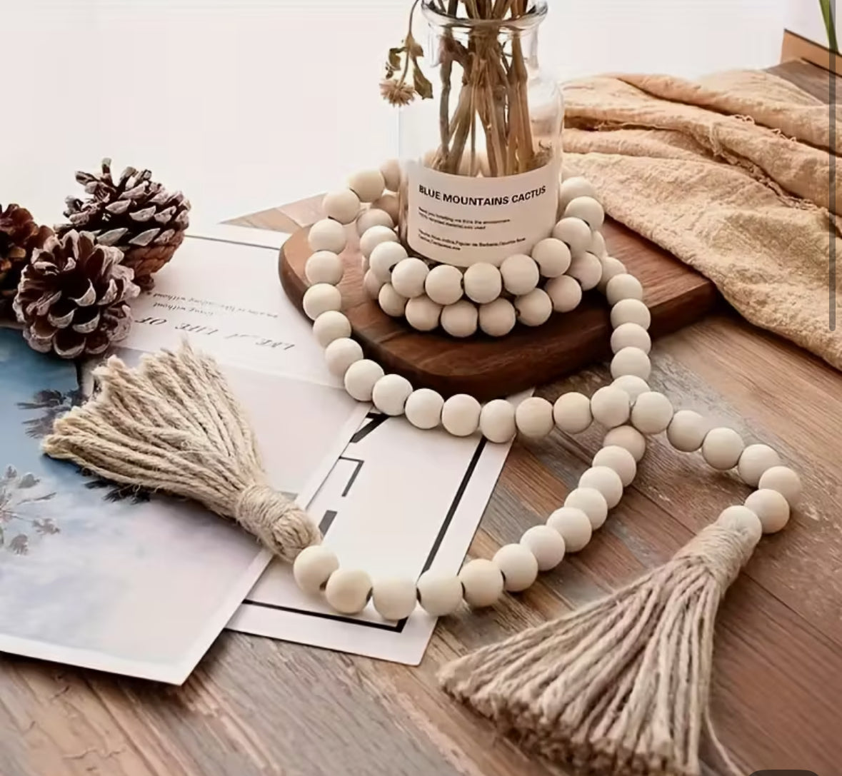 Bohemian Wooden Bead Garland with Tassel – Handmade Natural Wood Decor

 