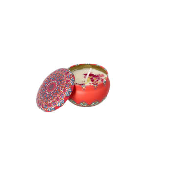 Scented candle with botanicals